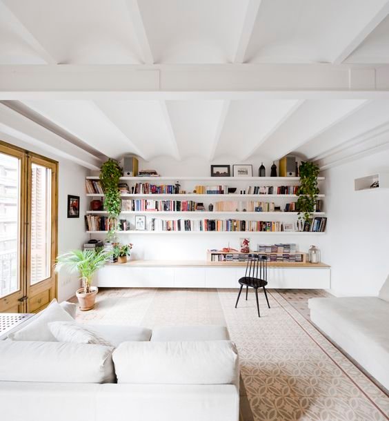 Wall-to-wall shelves in Barcelona, Spain by  Anna Eugeni Bach