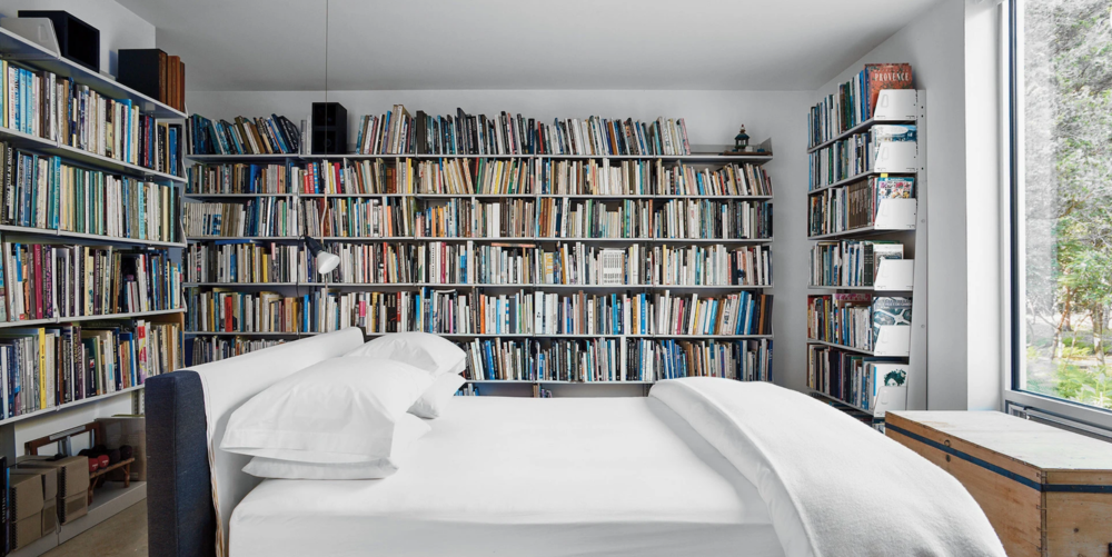 A bibliophile’s dream bedroom, belonging to artist Jack Ceglic and architect Manuel Fernandez-Casteleiro.