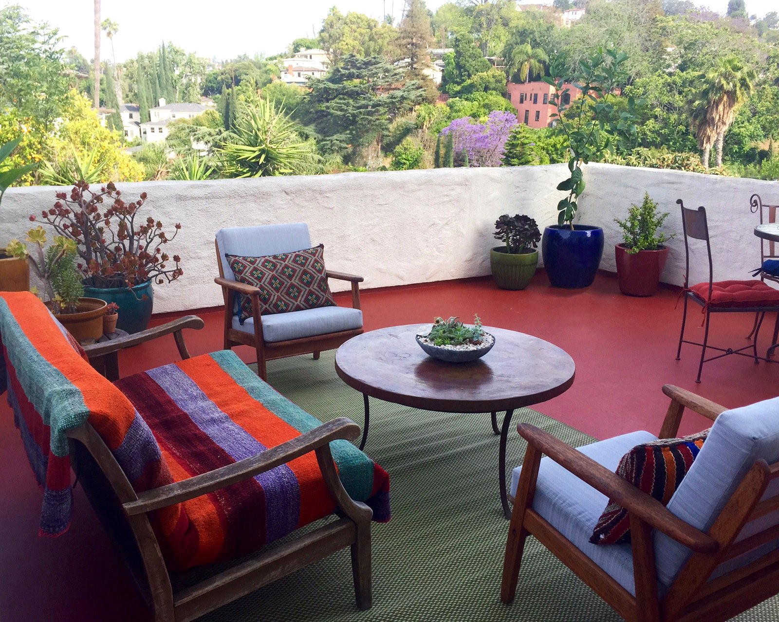 This Franklin Hills patio with an incredible view was staged and ready to roll for our client's cast and crew party and, come evening, the summer air and flickering candlelight completed the cozy scene.&nbsp;